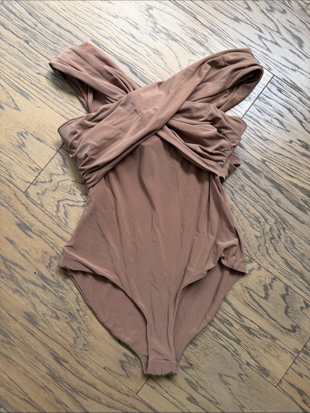 Women’s One-Piece bodysuit in nude. Soft Cross-Front Design
